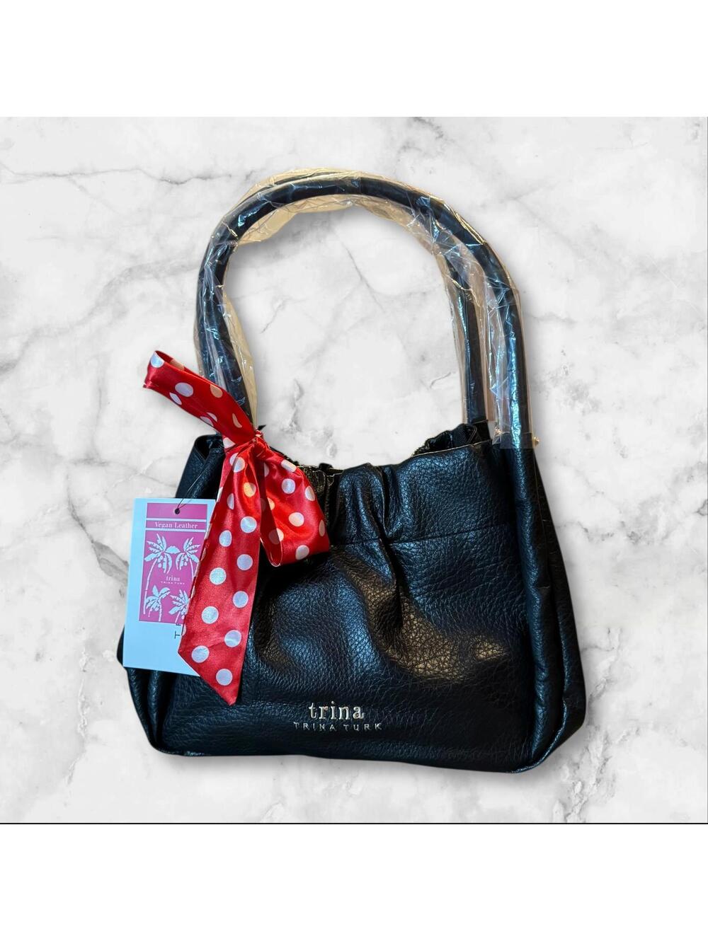 Trina Turk Black Leather Handbag with Red Polka Dot Bow